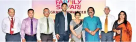  ??  ?? Ceylinco Life’s Family Ambassador­s with senior management of the company and representa­tives of the Revenue Department of the Western Provincial Council at the grand draw