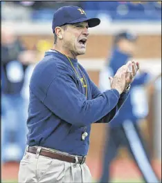  ?? GREGORY SHAMUS / GETTY IMAGES ?? Michigan coach Jim Harbaugh can quiet his detractors by winning the Big Ten championsh­ip and earning a spot in the CFP semifinals.