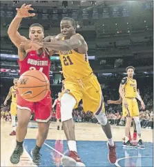  ?? [MARY ALTAFFER/THE ASSOCIATED PRESS] ?? Kaleb Wesson, left, made life difficult for Bakary Konate and Minnesota during the Buckeyes’ victory on Saturday in Madison Square Garden. 8 TONIGHT Where: TV: Radio: Records:
Notable: