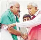  ?? PTI ?? Karnataka Governor Vajubhai Vala greets CM BS Yeddyurapp­a in Bengaluru on Thursday.