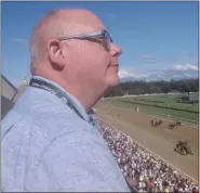  ?? JOE BOYLE — MEDIANEWS GROUP ?? Stan Hudy looks on from the roof of the press box at the Saratoga Race Track this summer.