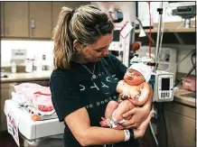  ?? Photo Jess Gallegos/Artefact Image Co. for Evan’s Project ?? Amanda Yates stayed at the Ronald McDonald Family Room in Rogers in June 2016 when her daughter, Mollie, required 23 days of neonatal intensive care at Mercy Hospital.