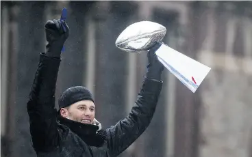  ?? MICHAEL J. IVINS / GETTY IMAGES ?? Tom Brady of the New England Patriots during a Super Bowl victory parade Tuesday.