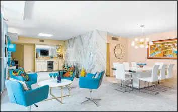  ?? BHHS ?? The historical Palm Springs condo has a midcentury design.