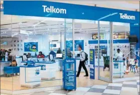 ?? Photo: Waldo Swiegers/bloomberg/getty Images ?? Challenge: Telkom employees are appealing a previous labour court ruling on their dismissal.