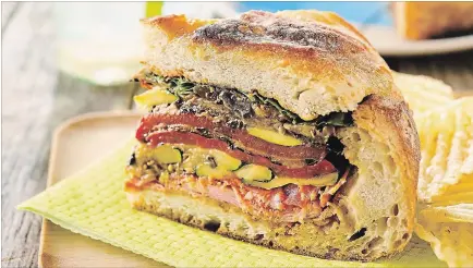  ?? METROLAND FILE PHOTO ?? A Muffuletta Sandwich takes time to prepare, as it uses an olive salad that has to marinate for 12 hours. But it’s worth it.