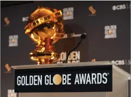  ?? CHRIS PIZZELLO — THE ASSOCIATED PRESS ?? A replica of a Golden Globe statue appears behind the podium at the nomination­s for the 81st Golden Globe Awards at the Beverly Hilton Hotel on Dec. 11.