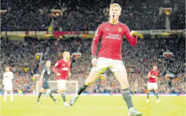  ?? AP ?? Manchester United’s Rasmus Hojlund celebrates after scoring their opening goal during the English Premier League football match against Tottenham Hotspur at the Old Trafford Stadium in Manchester, England, yesterday. The match drew 2-2.