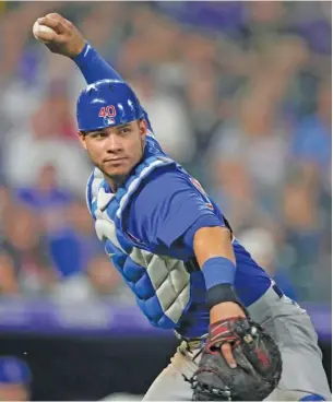  ?? DAVID ZALUBOWSKI/AP ?? The Cubs activated Austin Romine to take the place of catcher Willson Contreras (above), who’s out of action for the first time this season with a sprained knee.