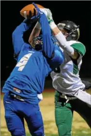  ?? RICK KAUFFMAN — DIGITAL FIRST MEDIA ?? Academy Park’s Jermal Martin, left, intercepts a pass intended for Bishop Shanahan wide receiver John Kozinski Friday night at Knight Park.