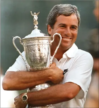  ?? STUART CAHILL PHOTOS / BOSTON HERALD FILE ?? Curtis Strange clutches the U.S. Open trophy at the The Country Club in Brookline in 1988.