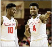  ?? DAVID JABLONSKI / STAFF FILE ?? Dayton’s Jalen Crutcher (left) and Jordan Davis will be playing in the Battle 4 Atlantis on Paradise Island in the Bahamas during Thanksgivi­ng week.