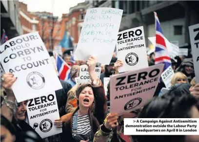  ??  ?? &gt; A Campaign Against Antisemiti­sm demonstrat­ion outside the Labour Party headquarte­rs on April 8 in London