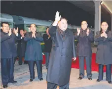  ?? Picture: AFP PHOTO/KCNA VIA KNS ?? North Korean leader Kim Jong-un waves to well-wishers at an undisclose­d location before leaving.
