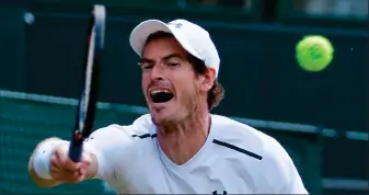  ?? AFP ?? A real stretch: Murray struggles to play through the pain on Centre Court