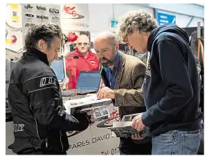  ??  ?? Hammond (left) and May (right) get tips from James Robinson, editor, The Classic Motorcycle