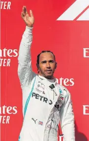  ?? /Mark Ralston/AFP ?? Triumph: Lewis Hamilton savours the moment after claiming the F1 driver’s world crown.