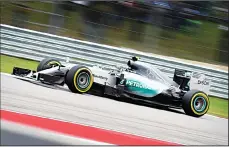  ??  ?? Mercedes AMG Petronas driver Nico Rosberg of Germany leads the race before eventually finishing in second place during the United States Formula One Grand Prix and the Drivers Championsh­ips at the Circuit of The Americas in
Austin, Texas on Oct 25....