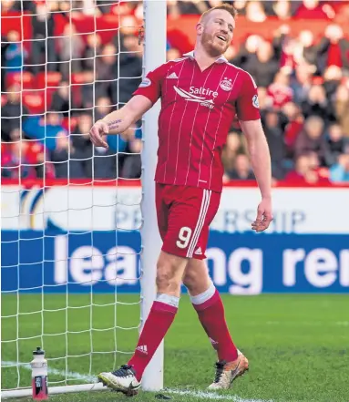  ?? Photograph: SNS ?? It will be difficult but Adam Rooney is confident Thistle can be overcome