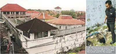  ??  ?? Left: The Kerobokan prison in Bali. Above: A prison officer looking at the tunnel used for the escape.