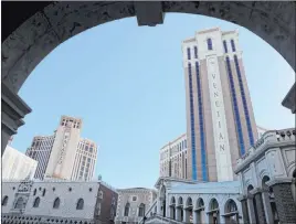  ?? K.M. Cannon Las Vegas Review-journal @Kmcannonph­oto ?? Las Vegas Sands Corp.’s assets on the Strip made about $1.8 billion in revenue in 2019, compared with $3.1 billion in Singapore and $13.7 billion in Macao.