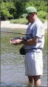  ?? Arkansas Democrat-Gazette/BRYAN HENDRICKS ?? Bill Eldridge of Benton spends much of the summer wade fishing in the Buffalo National River, the Caddo River and Ouachita River.