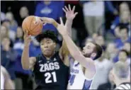  ?? NATI HARNIK — THE ASSOCIATED PRESS ?? Gonzaga’s Rui Hachimura (21) and Creighton’s Mitch Ballock (24) compete for a rebound during the first half of Saturday’s game in Omaha, Neb.