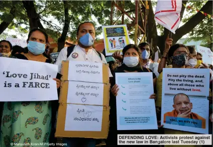  ??  ?? © Manjunath Kiran/AFP/Getty Images
DEFENDING LOVE: Activists protest against the new law in Bangalore last Tuesday (1)