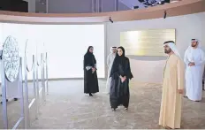  ?? WAM ?? ■ Shaikh Mohammad takes a look at an installati­on respresent­ing the four pillars of the We The UAE 2031 vision.