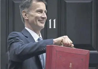  ?? PICTURE: JUSTIN TALLIS/AFP VIA GETTY IMAGES ?? What will Chancellor Jeremy Hunt produce from his red Budget box on March 6?