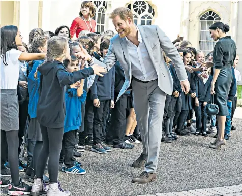  ??  ?? The Duke and Duchess at a school in Brighton, above; the couple at the University of Chichester Tech Park, top left