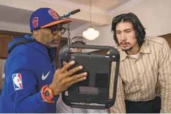  ?? David Lee Focus Features ?? SPIKE LEE — here with actor Adam Driver on the set of “BlacKkKlan­sman” — would be the first black filmmaker to win the Academy Award for directing.