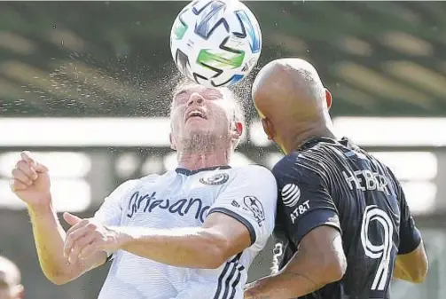  ?? AP ?? Philadelph­ia’s Kai Wagner (l.) and NYCFC’s Heber Araujo compete for the ball during the MLS is Back tournament in Orlando on Thursday.