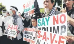  ??  ?? Muslim groups protest to condemn Washington’s decision to recognize Jerusalem as Israel’s capital outside the US embassy in Jakarta, Indonesia. — Reuters photo