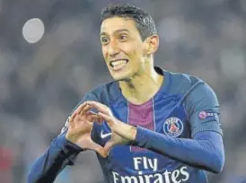 ?? AFP ?? Paris SaintGerma­in's Angel Di Maria celebrates after scoring in the Champions League round of 16 match against Barcelona at the Parc des Princes stadium in Paris.