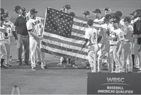  ?? MARK BROWN/GETTY IMAGES ?? The U.S. baseball team celebrates after qualifying for the Tokyo Olympics.