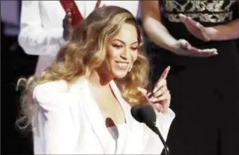  ??  ?? 50th NAACP Image Awards - Show - Los Angeles, California, U.S., March 30, 2019 - Beyonce reacts after winning the entertaine­r of the year award. (Reuters photo)