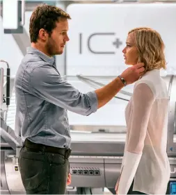  ??  ?? ANNORLUNDA RYMDFÄRD Chris Pratt och Jennifer Lawrence i en mix av romantiskt drama och sci fi.