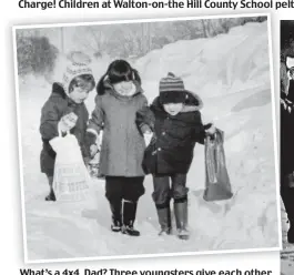  ??  ?? What’s a 4x4, 4x4 Dad? Three youngsters give each other a helping hand on their way to Donington Nursery School at Albrighton, Shropshire, in January 1982