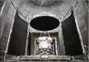  ??  ?? The Orion spacecraft has completed nearly four months of environmen­tal testing at NASA’s Plum Brook Station in Sandusky. The spacecraft sits in the world’s largest vacuum chamber opened up for viewing at a celebratio­n on Saturday.