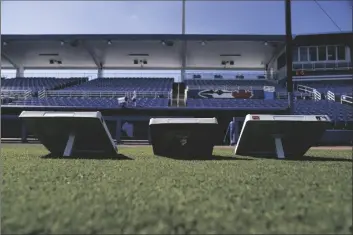  ?? AP PHOTO/BRYNN ANDERSON ?? The new, larger base sits next to the older, smaller base at TD Ballpark on Feb. 15 in Dunedin, Fla.