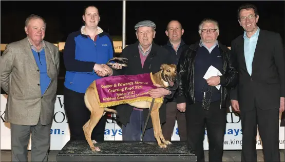  ?? Photo by www.deniswalsh­photograph­y.com ?? Jennifer Sherlock representi­ng the sponsors presents the winner’s trophy to winning trainer/owner Patrick O’Connor after Hawthorn Cree won the Quilter & Edwards MRCVS Coursing Bred Final at the Kingdom Greyhound Stadium last Saturday night. Included...