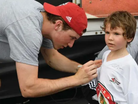  ?? BILL SMITH/GETTY IMAGES ?? Top prospect Nolan Patrick hasn’t been drafted yet, but he already has signing autographs down pat. His father and uncle both played in the NHL.