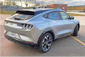  ?? PHOTOS BY MARK PHELAN/USA TODAY NETWORK ?? 2021 Ford Mustang Mach-E.