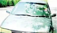  ?? HOPETON BUCKNOR ?? The bullet-riddled Toyota Corolla motor car in which Kemar Halstead and Michael Anthony Hill were travelling on Thursday.