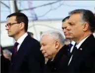  ??  ?? Polens statsminis­ter Mateusz Morawiecki (t.v.), landets sterke mann Jarosław Kaczyn´ski og Ungarns statsminis­ter Viktor Orbán ved avdukingen av en statue i Budapest i april.