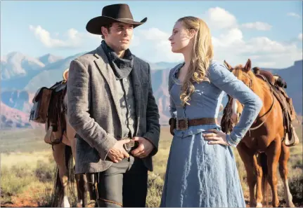  ??  ?? James Marsden as Teddy Flood and Evan Rachel Wood as Dolores Abernathy.