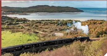  ?? JOHN DAVIDSON/ALAMY. ?? The Jacobite steams through from Fort William to Mallaig on October 8 2011, showing just how spectacula­r the scenery is on this line.