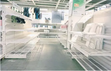  ?? GETTY IMAGES/AFP ?? Empty shelves are seen at an IKEA store in the Red Hook neighbourh­ood of Brooklyn borough in New York City on Oct 15.