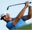  ?? CHRISTIAN PETERSEN/GETTY IMAGES ?? Dustin Johnson will take a three-tournament win streak into the Masters, which he’s never won.